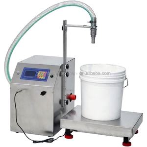 Machine de remplissage semi-automatique haute vitesse pour boissons liquides en grandes quantités, avec pesage quantitatif et débit élevé - Product Image 1