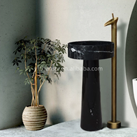 Lavabo sur pied en marbre naturel noir et blanc, finition polie avec veines naturelles, design personnalisé pour salle de bain de luxe
