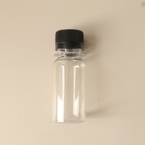 Vacío De plástico reciclable prensado en frío Fiery <span class=keywords><strong>Ginger</strong></span> <span class=keywords><strong>Shot</strong></span> 60ml Forma redonda PET Botellas de jugo Mini 2oz Inmunidad Wellness Shots - Product Image 2