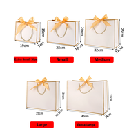 Sacs cadeaux de luxe pour boutiques, sacs en papier avec logo de marque personnalisable, sacs cadeaux en papier personnalisés