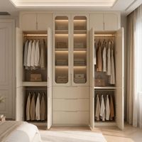 Armoire moderne à panneaux cannelés couleur crème, dressing sur mesure avec portes arquées vitrées à LED, design sans poignées