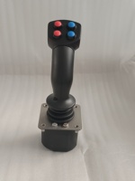 Manette de commande industrielle à axes X et Y avec poignée et quatre boutons poussoirs pour machines de construction