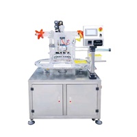 Machine de scellage thermique automatique pneumatique rotative pour films en rouleaux, certifiée CE, pour les industries des boissons et des produits chimiques