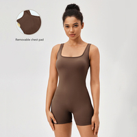 D42158 Yoga Onessuit avec coussin de poitrine pour les femmes corps nu serré hanche levage combinaisons course sport Yoga costume