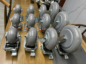 Rueda giratoria de caucho termoplástico gris de alta resistencia, con freno bloqueable, chapada en zinc, con protectores de rosca y placa de 5.5mm de espesor, amortiguadora. - Product Image 6