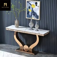 Table console argentée de style moderne avec miroir incurvé et pied en acier inoxydable Nouveau design de table d'entrée pour meubles de salon