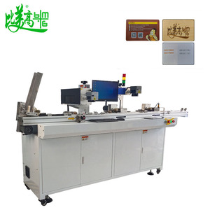 Máquinas de marcado láser de fibra Imprimir números Códigos digitales en lectores de tarjetas de plástico para máquina combinada de detección y rechazo - Product Image 1