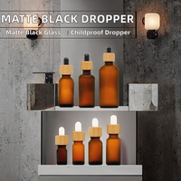 Flacon compte-gouttes en verre noir mat de 20 ml avec bouchon sécurité enfant et pompe à pression, pour huile capillaire, parfum, sérum, et diffuseur à bâtonnets en PP