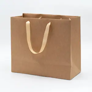 Luxury bulk brown kraft 50pcs recyclable shopping gift paper bag with handle