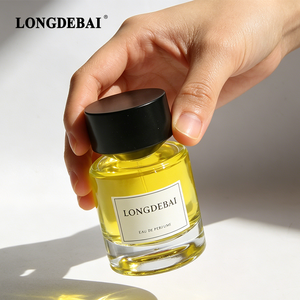 Wholesale Packaging Round Perfume Glass Bottle <b>Empty</b> Clear Crimp Cylinder 30ml 50ml 100ml Perfume Bottle with Gold Cap - Product Image 1