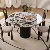 Mesa de comedor redonda de mármol francés estilo crema con base completa, diseño elegante y retro, ideal para casas pequeñas