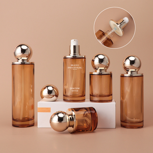 ขวดน้ำหอมแก้วสีเหลืองอำพันขนาด30มล. 50มล. 100มล. แบบพกพาขวดน้ำหอมแก้วใสทรงกลมพร้อมบรรจุภัณฑ์ - Product Image 1