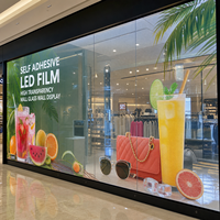 Film LED transparent adhésif pour écran mural en verre de centre commercial, à coller sur vitrine en verre
