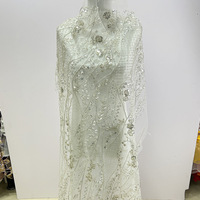 Tissu pour robe de mariée en dentelle brodée tube de perles à paillettes dorées pour la décoration de vêtements de performance