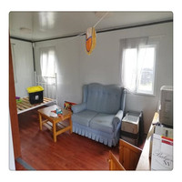Maison modulaire en acier de 20 pieds, préfabriquée, bureau et chambre pliables, extensible avec mur de remise Proctor Corner