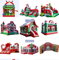 Château gonflable de Noël personnalisable avec toboggan pour fêtes et locations d'attractions en centre commercial