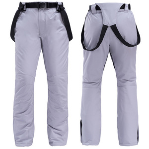 Barato invierno frío grueso cálido al aire libre a prueba de viento pantalones de esquí impermeables Unisex de talla grande mujeres hombres pantalones de esquí con tirantes de colores - Product Image 1