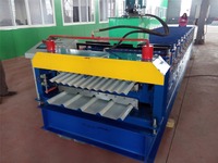 Machine de formage à rouleaux à double pont pour tôles d'acier de tuiles de toit trapézoïdales à ondulations d'eau
