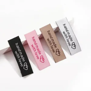 Etichetta per abbigliamento con etichetta tessuta con Logo stampato personalizzato per etichette tessute per abbigliamento e t-shirt
