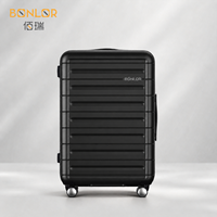 Valise à roulettes de luxe personnalisable en PC noir mat gaufré pour distributeurs de marques de prestige, commande en gros