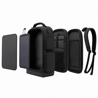 Sac à dos noir minimaliste et élégant à chargement solaire, grande capacité, avec poche latérale intégrée sur le panneau avant, idéal pour le travail et les voyages