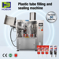 Machine à découper les bouchons en plastique Hebo, remplisseur de fond de flacon pour atomiseur, machine de remplissage et de scellage de crème en tube