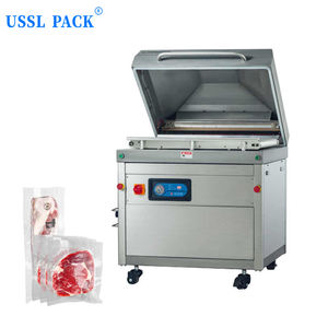 Machine d'emballage sous vide industrielle DZQ-850S avec chambre à roulement automatique et convoyeur à bande pour la viande et le bœuf - Product Image 1