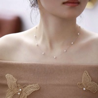 Collier ras du cou classique pour femme en argent S925 plaqué rhodium avec perle d'eau douce flottante délicate