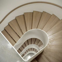 Design créatif moderne Escalier en colimaçon en acier courbé personnalisé en usine pour villas et hôtels