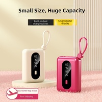 Batterie externe universelle en plastique de grande capacité avec câble intégré, charge super rapide 22,5 W, 10000 mAh, vente en gros
