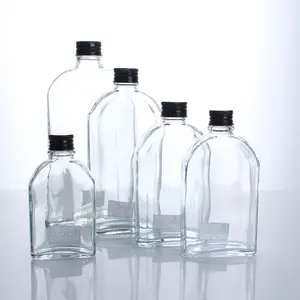 Venta caliente de todos los tamaños Mini botellas de vino de jugo de vidrio plano para bebidas