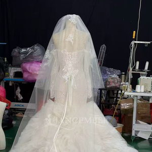 ชุดแต่งงานทรงเมอร์เมดประดับลูกปัดลายฉลุสีไอวอรี่สุดหรูหราพร้อมชายกระโปรงระบายแบบคลาวด์เทรน รุ่น Hz007 จาก Jancember - Product Image 4