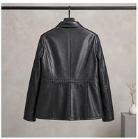 Veste en cuir de mouton pleine fleur noire pour femme, avec revers à motif losanges, coupe cintrée et courte, idéale pour les trajets quotidiens