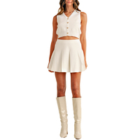 Vente en gros de gilet d'été personnalisé avec nœud et jupe de tennis courte, haut et short deux pièces, ensemble pull pour femme en maille fine