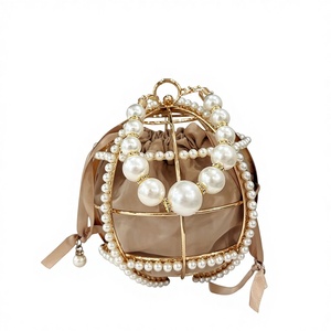 Sac à main sphérique ajouré tendance en PVC, style panier à légumes, sac de soirée en forme de cage à oiseaux orné de perles, en polyester Tanjing - Product Image 1