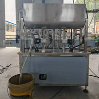 Équipement de remplissage de haute qualité, machine de remplissage de jus de fruits, de vin et d'huile d'olive pour le remplissage de bouteilles en verre/bouteilles en plastique.
