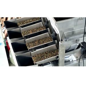 Pesadora LINEAL VERTICAL automática de 4 cabezales para empacadora de juguetes de frutas secas - Product Image 4