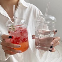 Vente en gros de tasse à boisson de grande capacité résistante aux hautes températures tasse à lait tasse à thé vent verre avec couvercle avec paille