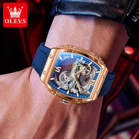 OLEVS 6779 Montre mécanique automatique lumineuse à squelette creux, étanche, en caoutchouc, de marque, avec logo personnalisé OEM, pour homme