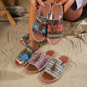 2025 Retro Bohemia Floral patrón geométrico ancho PU cuero correa cruzada punta abierta zapatillas para mujer playa borlas Sandalias planas - Product Image 1