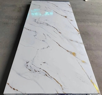 Panneaux muraux en PVC sur mesure, imperméables, faciles à installer, feuilles de marbre UV, application moderne pour l'intérieur