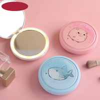 Miroir cosmétique LED portable pour femmes, idéal pour les voyages, double face, pliable, forme ovale, avec éclairage intégré et cadre en plastique