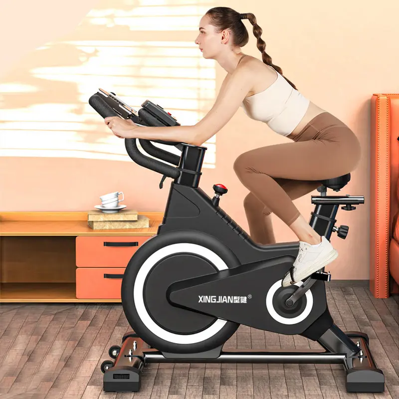 Bicicleta de spinning comercial Fitness profesional Ajuste de cuerpo magnético Bicicleta de spinning de ejercicio interior