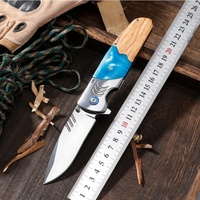 Couteau de chasse pliant portable en acier inoxydable avec manche en bois d'olivier et résine, idéal pour le camping et les activités de plein air, vente en gros pour petites commandes