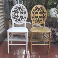 Silla de plástico blanco de boda moderna barata al aire libre con cojín