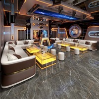 Ensemble de canapés futuristes en forme de U, capitonnés, couleur crème, avec table basse éclairée par LED pour la maison, le bar, l'hôtel, le KTV