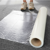 Rouleau de protection de sol auto-adhésif réutilisable et imperméable en film PE et polyester, 25m 50m, avec logo personnalisé, pour la peinture