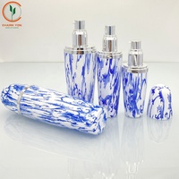 30ml 50ml 80ml Vente en gros Sérum cosmétique Bouteilles et emballages vides en céramique porcelaine bleue et blanche pour soins de la peau personnalisés