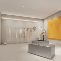 Tienda de ropa moderna Diseño de estante de exhibición interior Exhibición de ropa personalizada Isla Moda Boutique Ideas de decoración