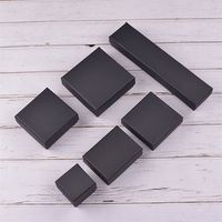 Boîte cadeau pour montre en papier rigide noir magnétique avec insert en mousse, pelliculage mat et gaufrage, papier couché